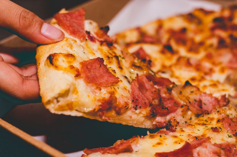 Meat Lovers Supreme pizza loaded with pepperoni, sausage and bacon